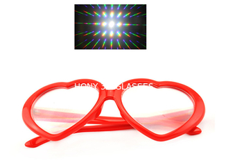 Κόκκινα καρδιών πλαισίων πλαστικά διάθλασης γυαλιά ουράνιων τόξων πυροτεχνημάτων τρισδιάστατα για το κόμμα